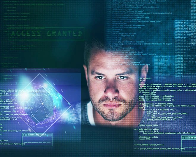 Focused male analyst stares at multiple translucent code screens, with holographic network graphics and an “ACCESS GRANTED” prompt glowing around him.