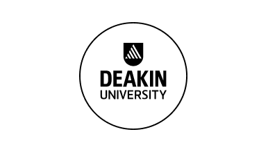 Deakin University logo featuring a white circle with black outline enclosing a black shield with a triangular icon above the bold word ‘Deakin’ and ‘University’ in sans-serif font below.