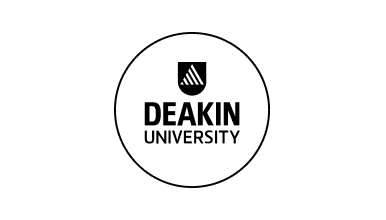 Deakin University logo featuring a white circle with black outline enclosing a black shield with a triangular icon above the bold word ‘Deakin’ and ‘University’ in sans-serif font below.