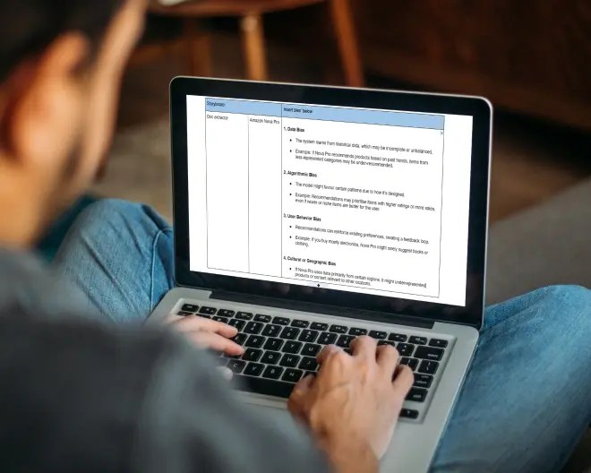 Close-up of a person’s hands typing on a laptop on their lap, with a storyboard displayed on the screen.